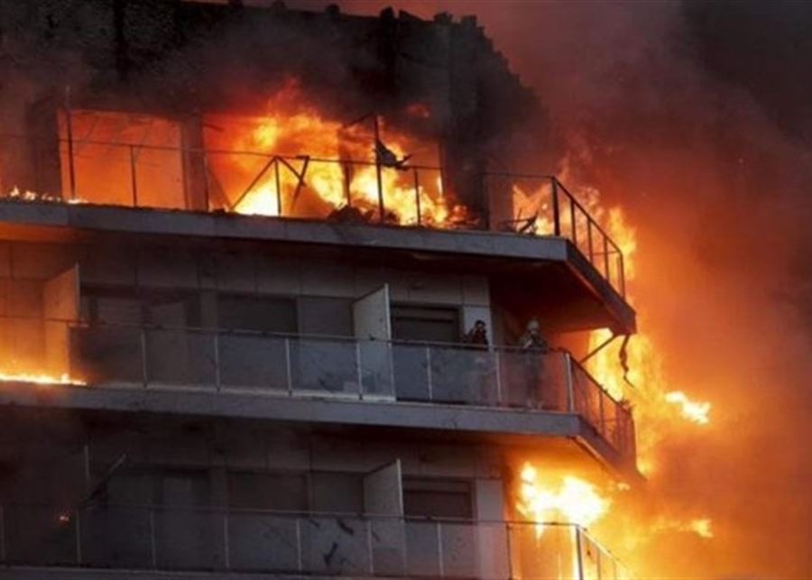 Four dead, up to 14 missing in Spain apartment building fire
